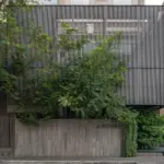 ady-putra-architect-design-firm-transforms-dual-shophouses-into-jordnara-cafe-and-phomi-showroom