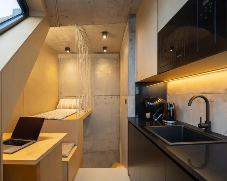 so-arquitetura-transforms-a-13-square-meter-storage-unit-into-a-compact-coastal-home-in-the-azores