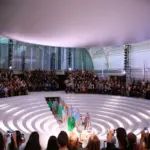 the-path-of-the-runway-rewritten-how-four-decades-of-set-design-redefined-the-fashion-show