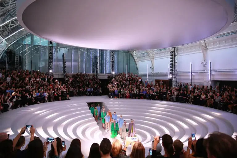 the-path-of-the-runway-rewritten-how-four-decades-of-set-design-redefined-the-fashion-show